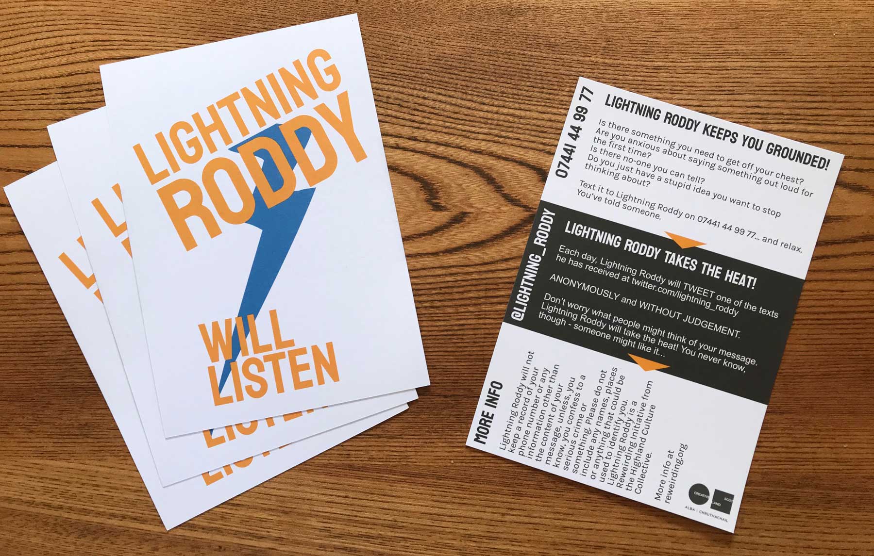 Lightning Roddy flyers on a wooden table